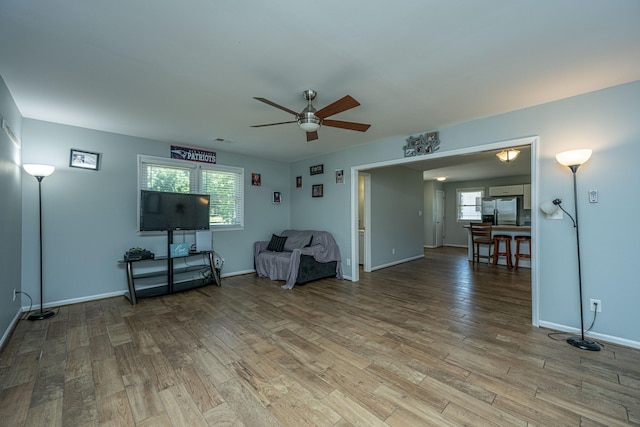 unfurnished room featuring light hardwood / wood-style flooring and ceiling fan