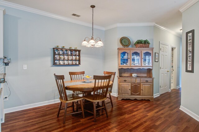 1335 Hopton Cir Unit 1335, Mount Pleasant, SC 29466 - dining area featuring dark wood-style flooring, ornamental molding, baseboards, and a chandelier