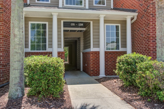 1335 Hopton Cir Unit 1335, Mount Pleasant, SC 29466 - property entrance featuring brick siding and covered porch