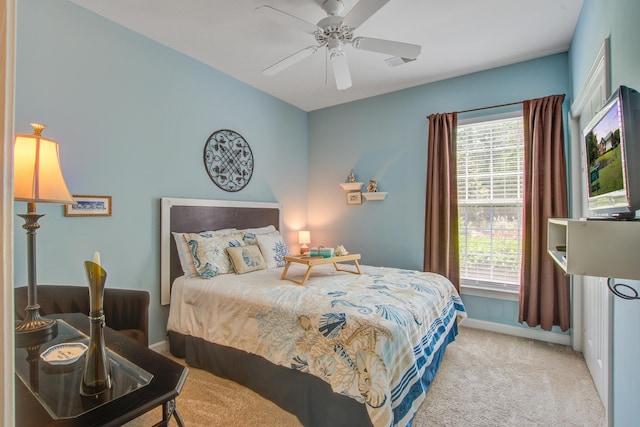 1335 Hopton Cir Unit 1335, Mount Pleasant, SC 29466 - carpeted bedroom with multiple windows, baseboards, and a ceiling fan