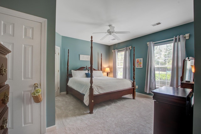 1335 Hopton Cir Unit 1335, Mount Pleasant, SC 29466 - bedroom featuring baseboards, light carpet, and a ceiling fan