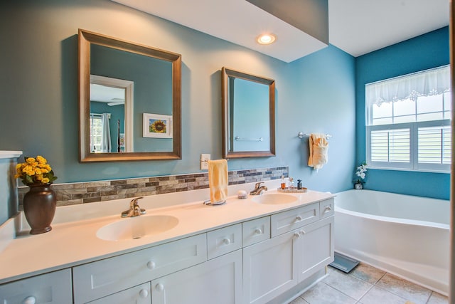 1335 Hopton Cir Unit 1335, Mount Pleasant, SC 29466 - full bathroom featuring double vanity, a garden tub, tile patterned flooring, and recessed lighting