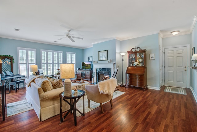 1335 Hopton Cir Unit 1335, Mount Pleasant, SC 29466 - living room featuring dark wood-type flooring, a ceiling fan, a premium fireplace, crown molding, and baseboards