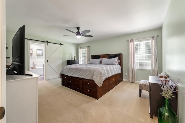 44 S Basilica Ave, Hanahan, SC 29410 - bedroom with a barn door, light carpet, ceiling fan, and baseboards