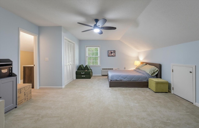 44 S Basilica Ave, Hanahan, SC 29410 - bedroom with light colored carpet, vaulted ceiling, a closet, a ceiling fan, and baseboards