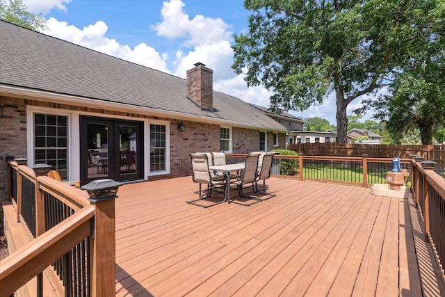 44 S Basilica Ave, Hanahan, SC 29410 - wooden terrace featuring outdoor dining space, a fenced backyard, and french doors