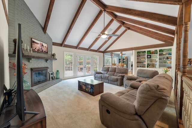 44 S Basilica Ave, Hanahan, SC 29410 - carpeted living room featuring high vaulted ceiling, french doors, ceiling fan, a fireplace, and beamed ceiling