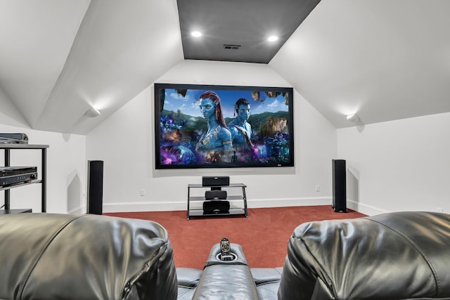 carpeted home theater room with vaulted ceiling, baseboards, and recessed lighting
