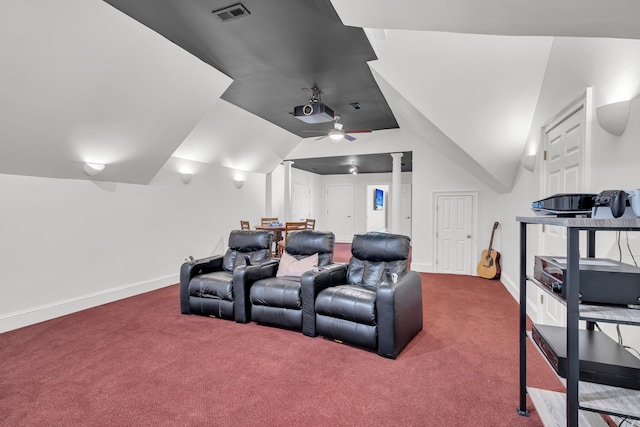 home theater room featuring carpet flooring, a ceiling fan, vaulted ceiling, and baseboards