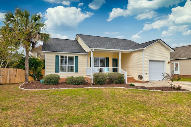 single story home with a porch, a garage, and a front yard