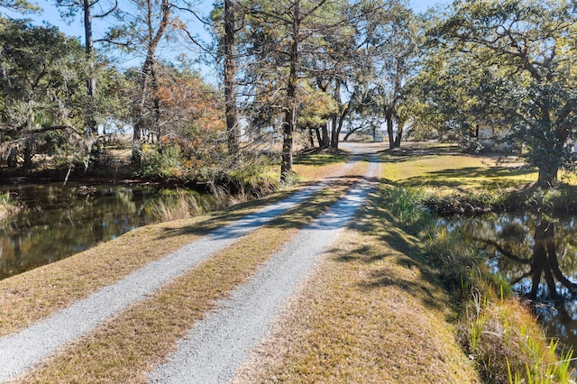 view of road featuring a water view