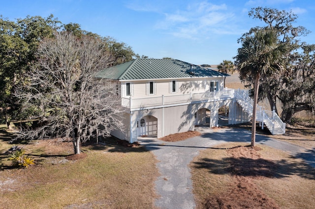 view of front of home featuring a carport