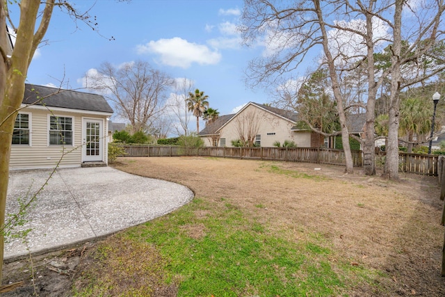 view of yard with a patio and a fenced backyard