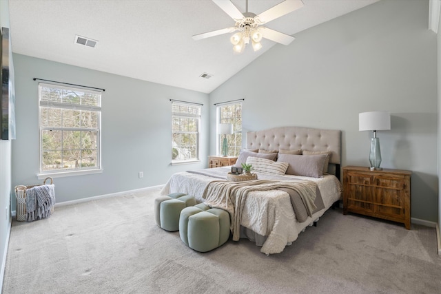 carpeted bedroom with a ceiling fan, baseboards, and visible vents