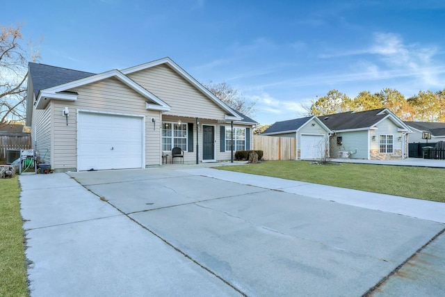 ranch-style home featuring a garage and a front yard