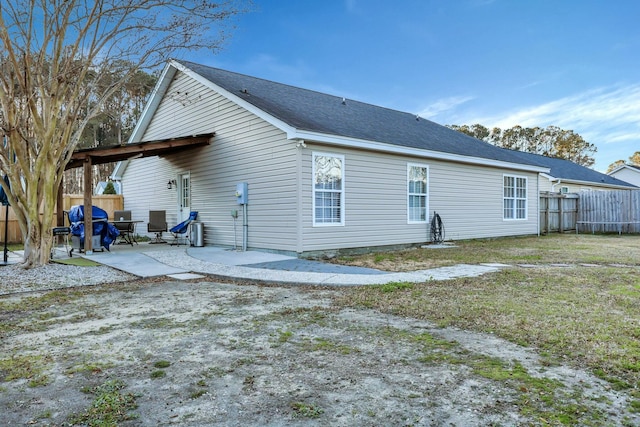 back of house with a patio area