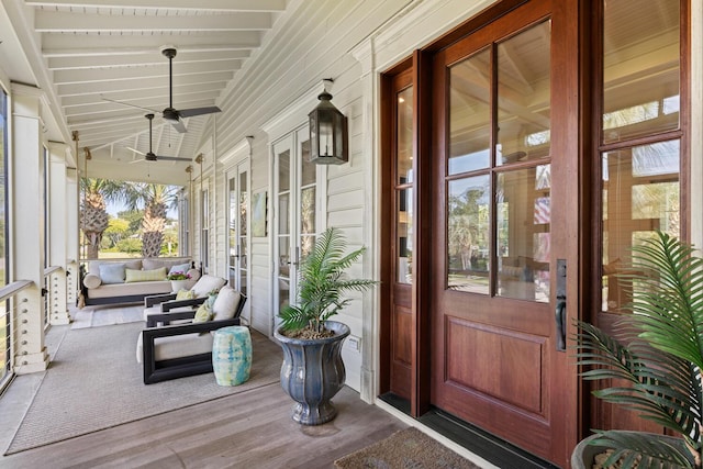 property entrance with ceiling fan