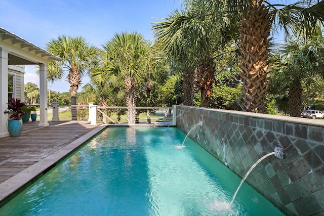 view of pool featuring pool water feature