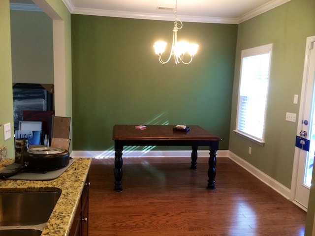 1720 Restoration Ct, Charleston, SC 29414 - dining space with crown molding, a chandelier, and dark wood-type flooring