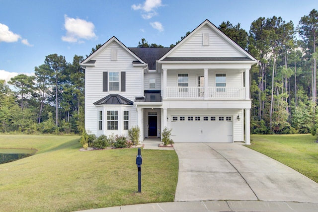 view of front facade with a front yard and a garage