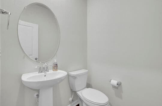 bathroom featuring toilet