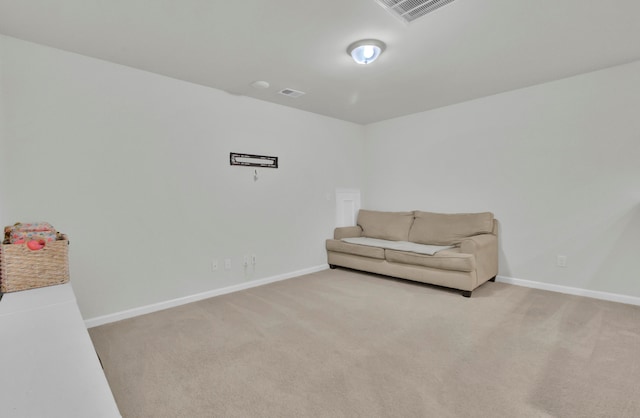 living area with light colored carpet