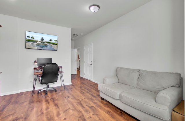 office space with hardwood / wood-style flooring