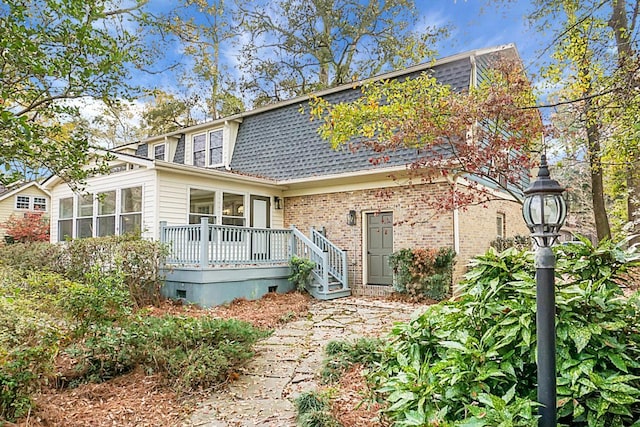 view of front of house with a deck