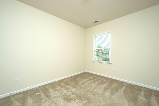 spare room with carpet floors