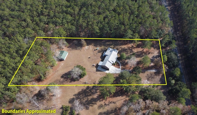 drone / aerial view with a forest view