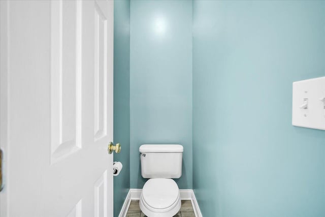 144 Back Tee Cir, Summerville, SC 29485 - bathroom with baseboards, wood finished floors, and toilet