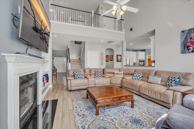 144 Back Tee Cir, Summerville, SC 29485 - living area featuring stairs, ceiling fan, visible vents, light wood-style flooring, and a fireplace