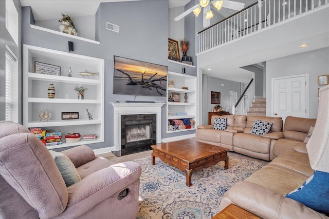 144 Back Tee Cir, Summerville, SC 29485 - living room with built in features, visible vents, wood finished floors, and a ceiling fan