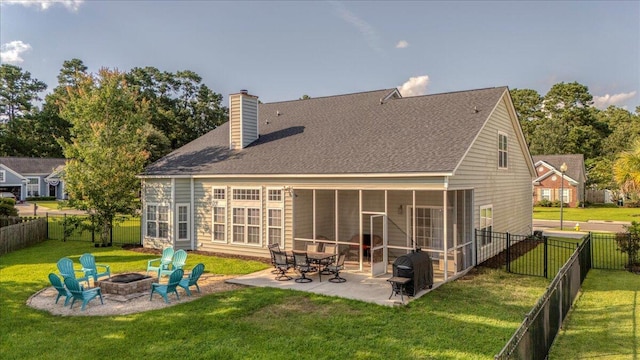 144 Back Tee Cir, Summerville, SC 29485 - rear view of house featuring a fenced backyard, a fire pit, a yard, and a patio
