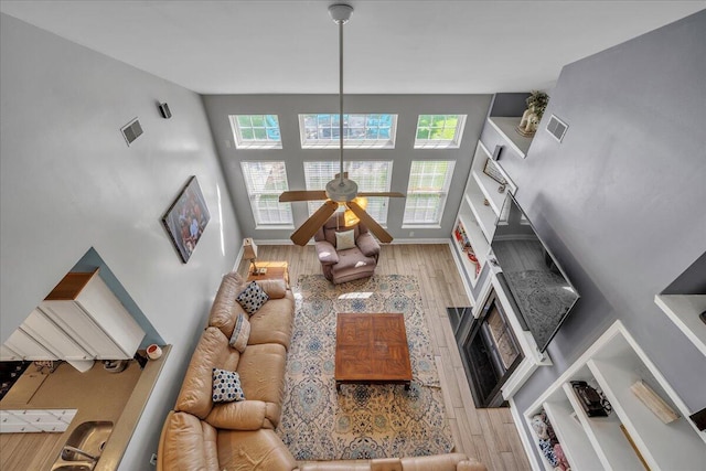 144 Back Tee Cir, Summerville, SC 29485 - living area with baseboards, visible vents, wood finished floors, and a ceiling fan