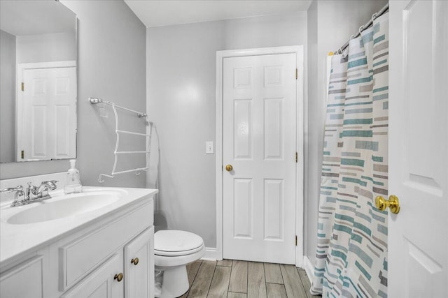 144 Back Tee Cir, Summerville, SC 29485 - bathroom with a shower with shower curtain, baseboards, toilet, vanity, and wood tiled floor