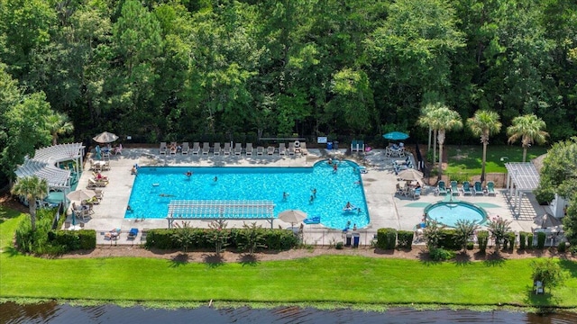 144 Back Tee Cir, Summerville, SC 29485 - community pool featuring a lawn, fence, and a patio area