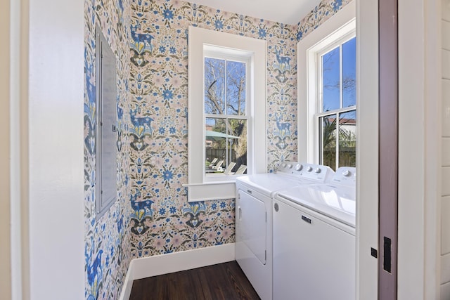 washroom with washer and dryer, plenty of natural light, laundry area, and wallpapered walls