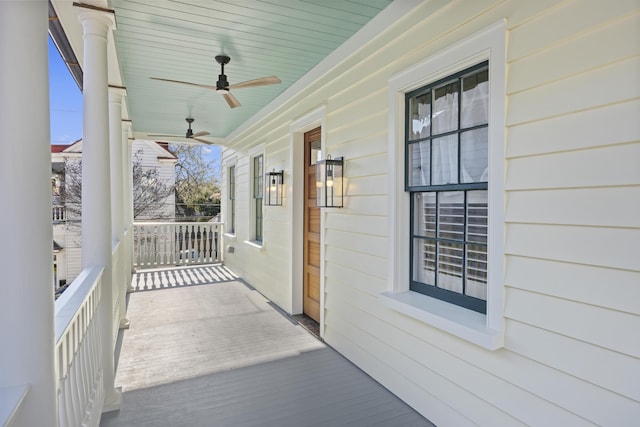 exterior space with ceiling fan