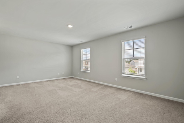 183 Greenwich Dr, Summerville, SC 29486 - empty room featuring visible vents, baseboards, recessed lighting, and light carpet