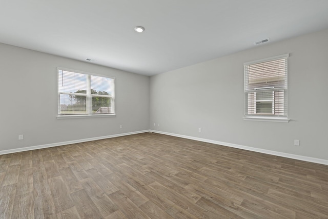 183 Greenwich Dr, Summerville, SC 29486 - unfurnished room with visible vents, baseboards, and wood finished floors