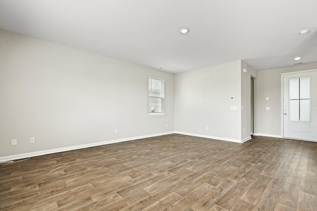183 Greenwich Dr, Summerville, SC 29486 - unfurnished room featuring visible vents, baseboards, recessed lighting, and wood finished floors