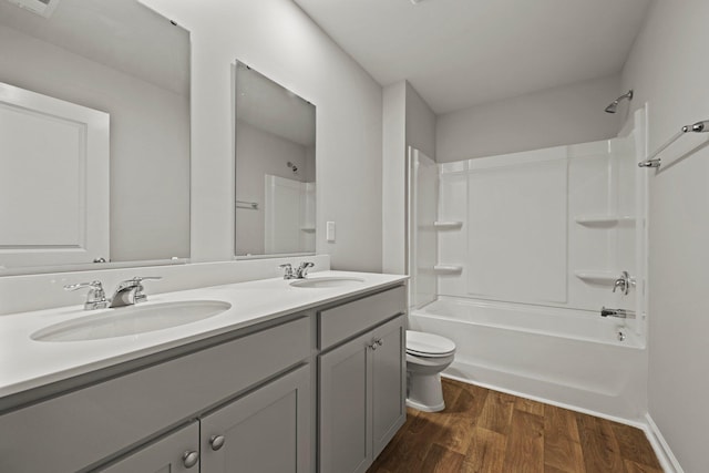 183 Greenwich Dr, Summerville, SC 29486 - bathroom with a sink, toilet, double vanity, and wood finished floors