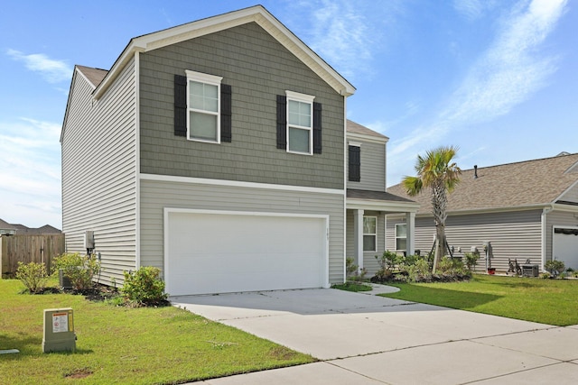 183 Greenwich Dr, Summerville, SC 29486 - traditional-style home featuring driveway, a garage, fence, and a front lawn