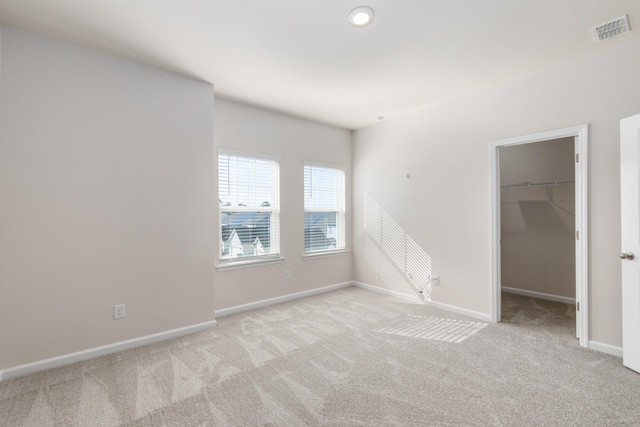304 Pathfinder Way, Charleston, SC 29492 - unfurnished bedroom with carpet flooring, baseboards, a spacious closet, and recessed lighting