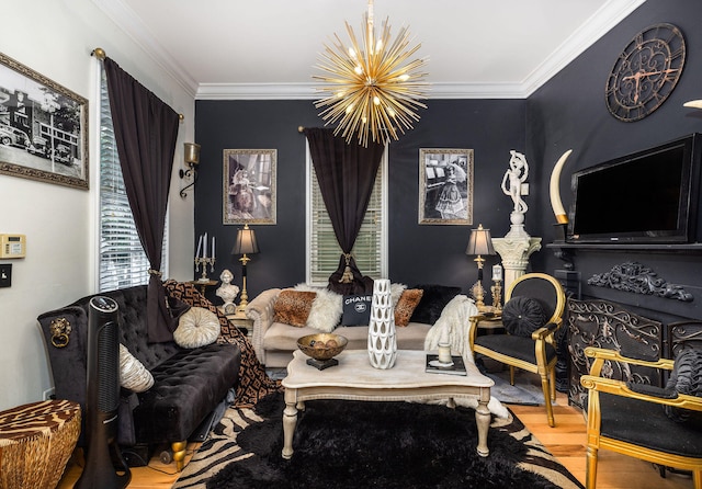 living room with crown molding, hardwood / wood-style floors, and a chandelier