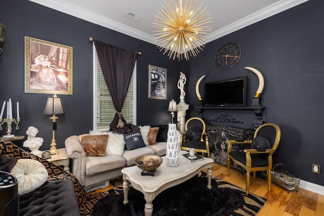 living room featuring wood-type flooring, crown molding, and a chandelier