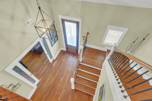 entrance foyer with hardwood / wood-style floors