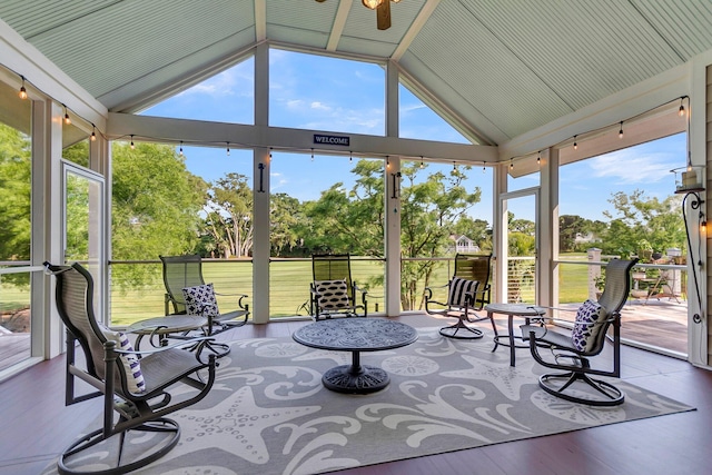 sunroom / solarium with lofted ceiling