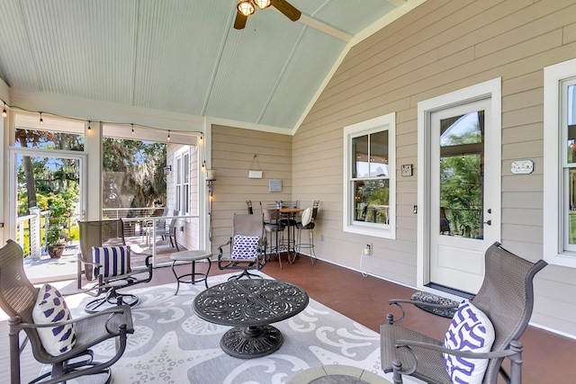 exterior space featuring vaulted ceiling and ceiling fan